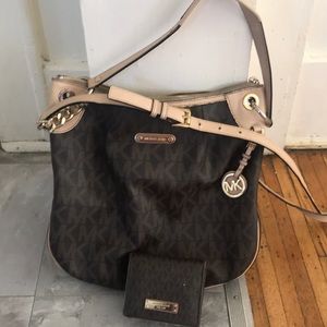Michael Kors Hand Bag with Wallet to match.
